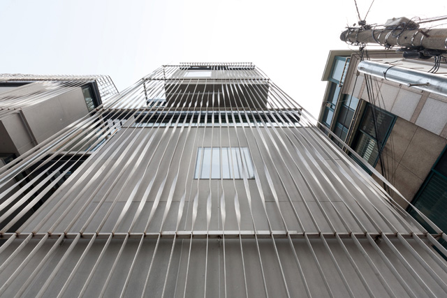 The multifunctional screen works as railings, barrier, and drainage paths.